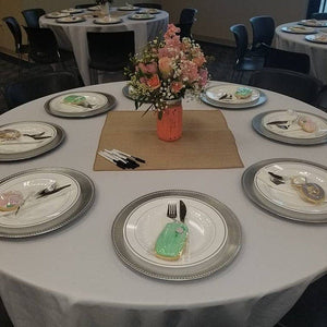 White  Poly premier table linens during a private reception