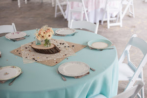 White Poly premier table linens pictures with place setting and wooden centerpiece