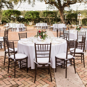 Beautiful Outdoor wedding setting with Poly premier linens in white