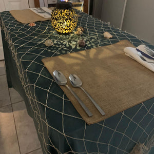 Jute burlap placemats on a table with beach decorations