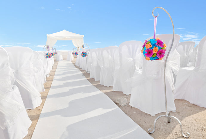 carpet aisle runner at beach wedding 