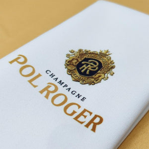 Close-up of white napkin with 2 color print for Pol Roger Champagne