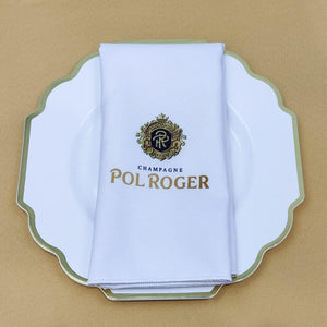 Custom printed napkin in white folded on plate