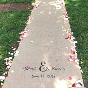 Printed burlap aisle runner with flowers on it