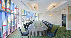 Large oval tablecloth in a meeting room