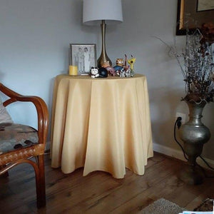 Classy Poly table linen at-home setting with a photo frame and knick-knacks