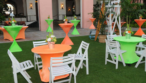 Fitted tablecloths on multiple tables in an outdoor low key event