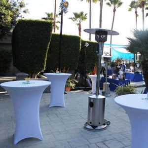 Spandex cocktail covers in white  during an outdoor reception at a hotel