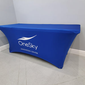 Stretch Spandex table cover in blue with white One Sky Innovation Center corporate logo 
