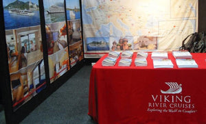 Custom printed table cover with reading material on top for Viking River Cruises