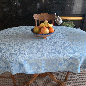 Vintage oval tablecloth in a country home 