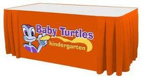 Red table skirt with full-color front panel print for Baby Turtles Kindergarten