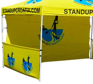 Yellow custom-printed tent with matching sidewalls and backdrop for Stand Up Croatia event