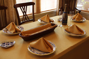 Havana Faux Linen Napkins on a family lunch table with plates and wine glasses