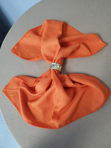 Havana Linen napkin on a table through a napkin ring 