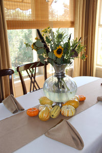 Natural colored Havana Dinner napkins with a matching table runner and Jack Be Little Squash