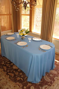 Havana tablecloth, blue with white cloth napkins and china