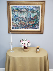 Havana tablecloth, tan table linen with a vase of white flowers