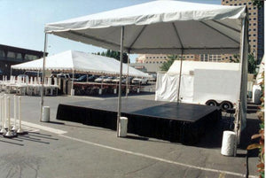 Stage skirt under a tent for outdoor event