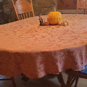 Fall oval tablecloth with fall decoration.