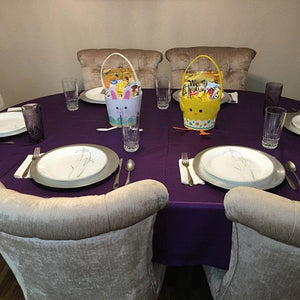 Purple Majestic oval tablecloth in a home during Easter