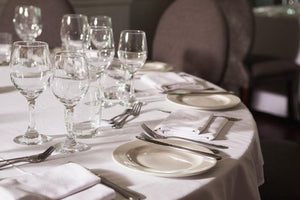 Cotton twill linen on a round table with matching napkins at a restaurant