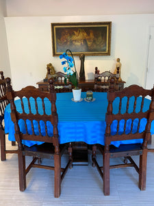 Poly Stripe blue Oval Tablecloth in a home dining room table