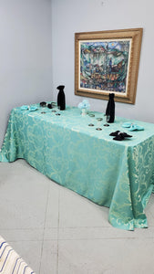 Frederic Damask tablecloth in an elegant art gallery