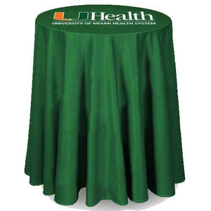 Custom top print on a round green tablecloth for the University of Miami