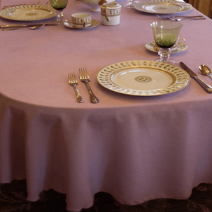 Dusty Rose Table linen with plates, silverware, and coffee cups