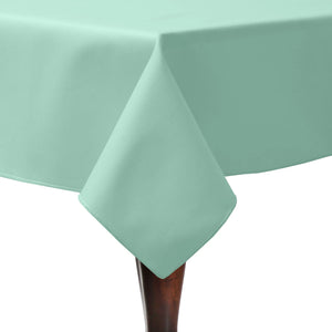 Formal linens on a square restaurant table