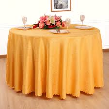  Round Poly Goldenrod color table linens with glasses