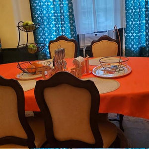Orange oval table cloth