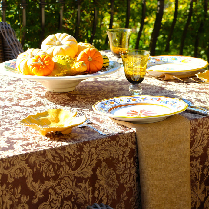 Outdoor lunch scene with elegant Miranda linens