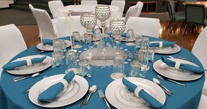 blue round tablecloth and napkins at a wedding