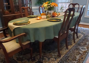 English linen tablecloth and napkins on a large oval table