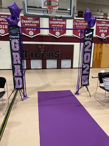Purple gratuation aisle runner at a school graduation