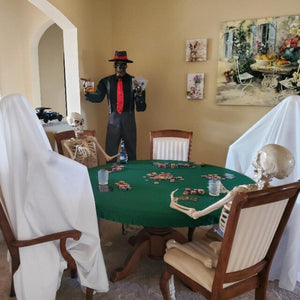 Green vinyl fitted tablecloth on a round table