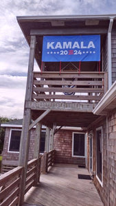 Kamala for president hanging banner