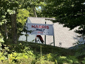 Harris Walz presidential banner hanging