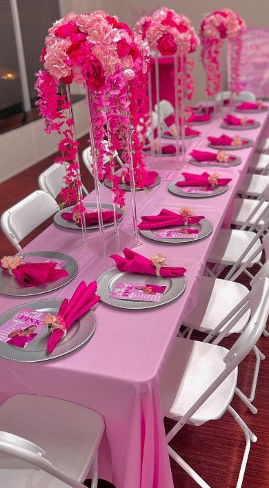 Pink Poly tablecloth with matching flowers and napkins for a Mary Kay meeting