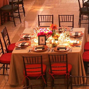 Panama Rental table linens on large square tables at a fancy wedding reception