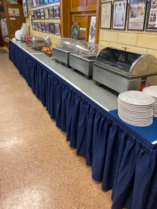 Poly Premier shirred pleat table skirting on a lodge buffet table