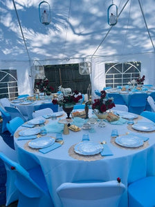 Blue table cloth at a tent wedding reception