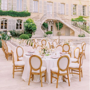 Exquisite Duchess Bridal Linens at a lavish outdoor wedding reception