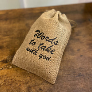 Custom printed 6" x 10" Burlap bag with black lettering