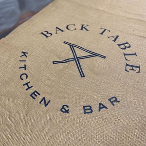 burlap table runner with black logo for blue table kitchen and bar