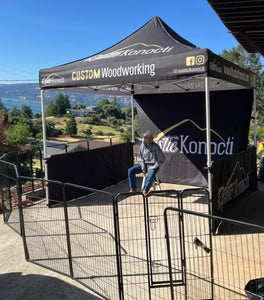 custom canopy tent set up outdoors overlooking city