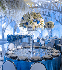 Majestic linens at a elaborate wedding with large flower