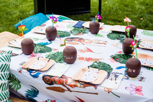 Custom printed tablecloth at a backyard party